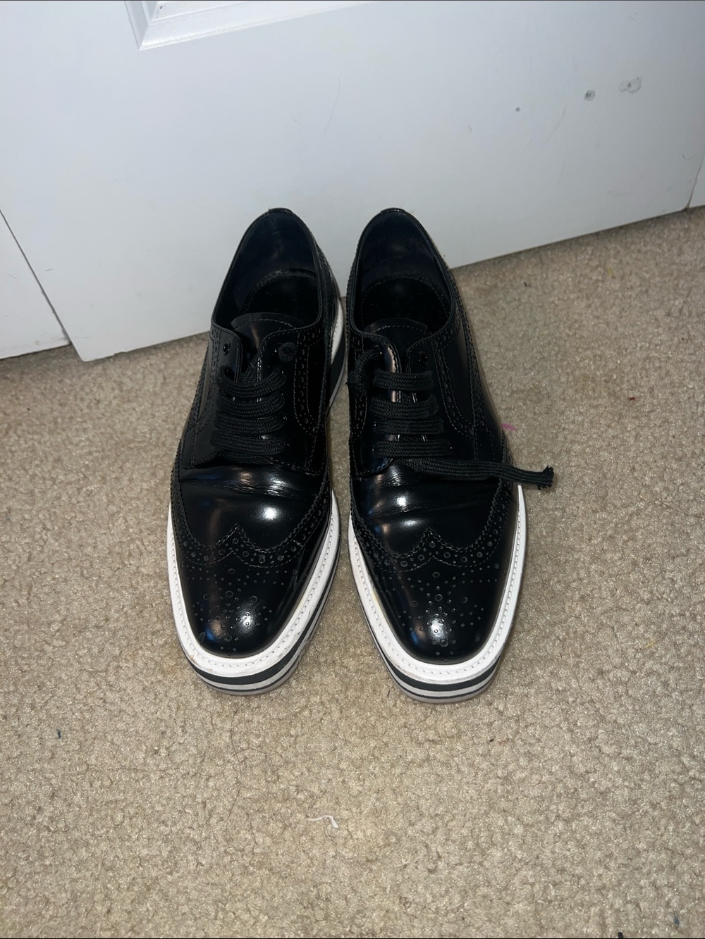 Prada Black Patent Leather Brogue with a White Sole